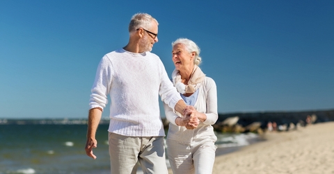 Older couple happy at the beach