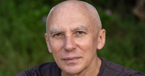 Close up of a bald man in his 60s