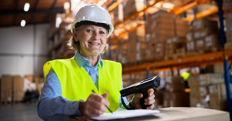 Older woman working in warehouse