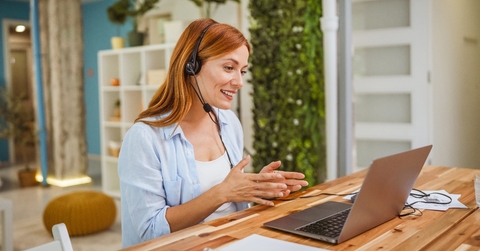 Woman working from home, on a digital meeting