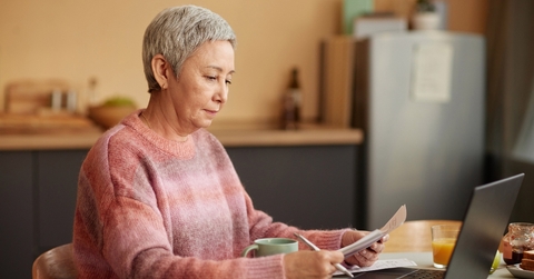 Senior woman reviewing paperwork