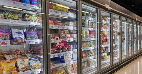 Frozen food aisle in grocery store