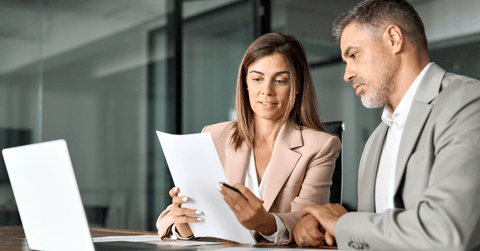 Woman banking with advisor