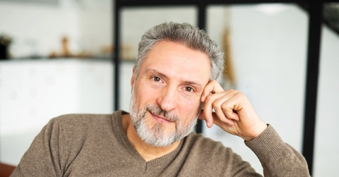 Man in his mid 60s looking at camera