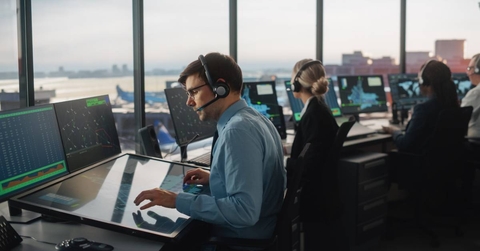Air Traffic Control Team Working in a Modern Airport Tower