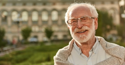 Portrait of a senior man smiling outdoors 