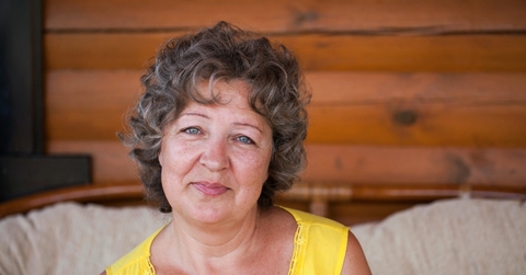 Woman white curly short white hair 