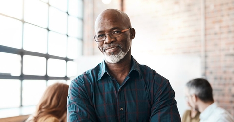 Portrait of a mature businessman in office setting