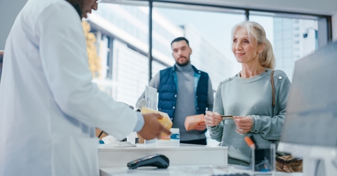 A woman at a pharmacy