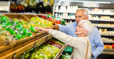 Senior couple grocery shopping