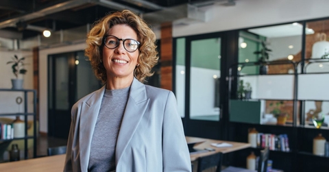 Smiling business woman in an office