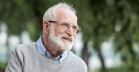 Smiling senior man in park