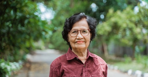 Close up portrait of senior woman in the park