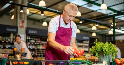 Senior working at grocery store
