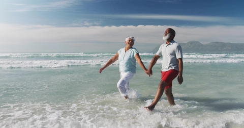 strolling retirees in beachwear
