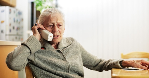 Concerned senior woman on phone