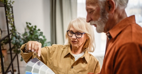 Retiree couple picking colors to remodel the house