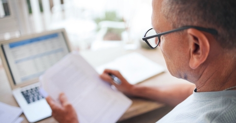 Man looking over finances