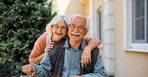 Smiling senior couple outdoors