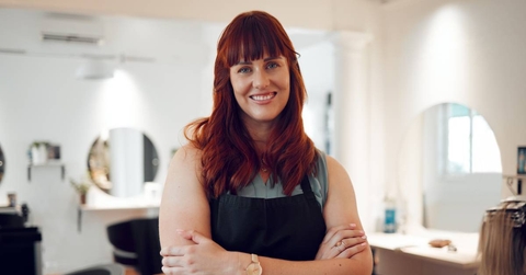 Portrait of happy hairdresser with smile