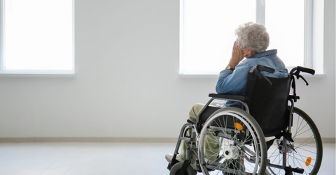 Senior woman in wheelchair indoors