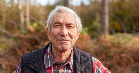 Portrait of senior man outdoors during fall