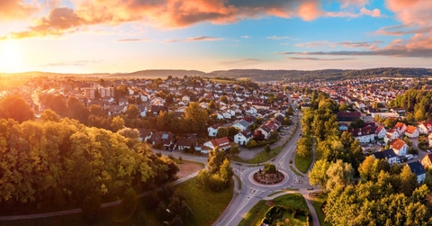 A small town in the mountains at sunrise
