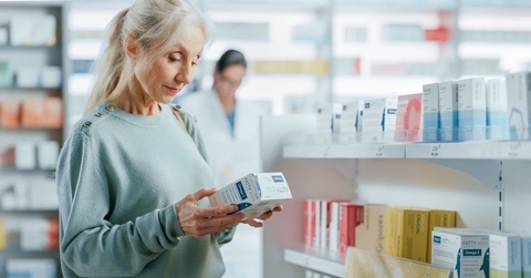 Senior woman shopping at pharmacy