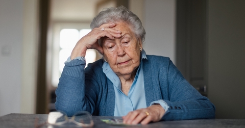 Senior woman worried about money