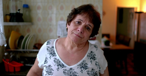 Woman in her 60s looking sad
