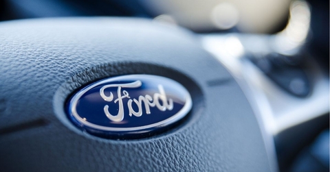 Ford sign on steering wheel close up