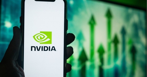 Hand Holding Phone with NVIDIA (NVDA) Logo