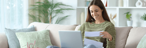 Woman doing online banking at home