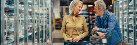 Boomer couple shopping for groceries