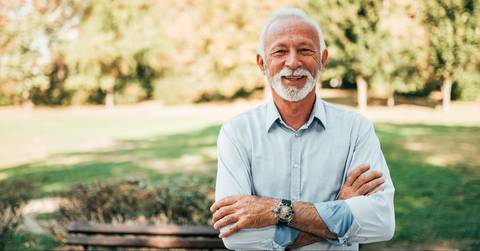  smiling older man in the park