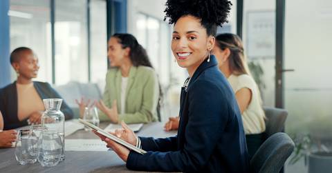 female worker working on digital technology