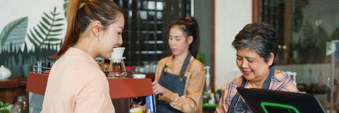 client paying to asian cafe owner