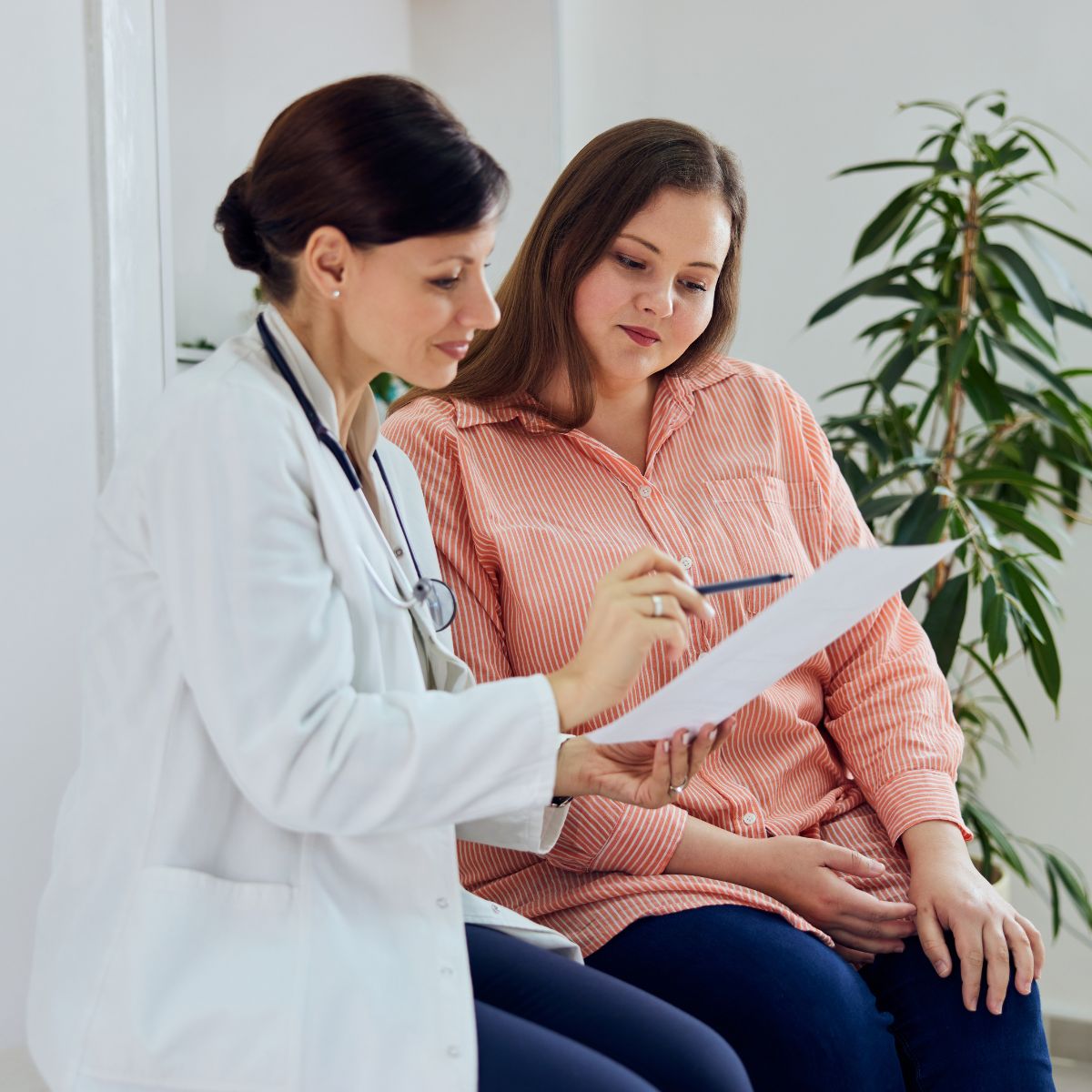 Healthcare provider talking with a patient